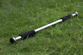 Steel adjustable pull-up bar mounted in doorway showing 62-100cm width range