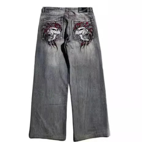 Men's light grey washed-out denim jeans with a wide-leg straight cut and retro workwear style.