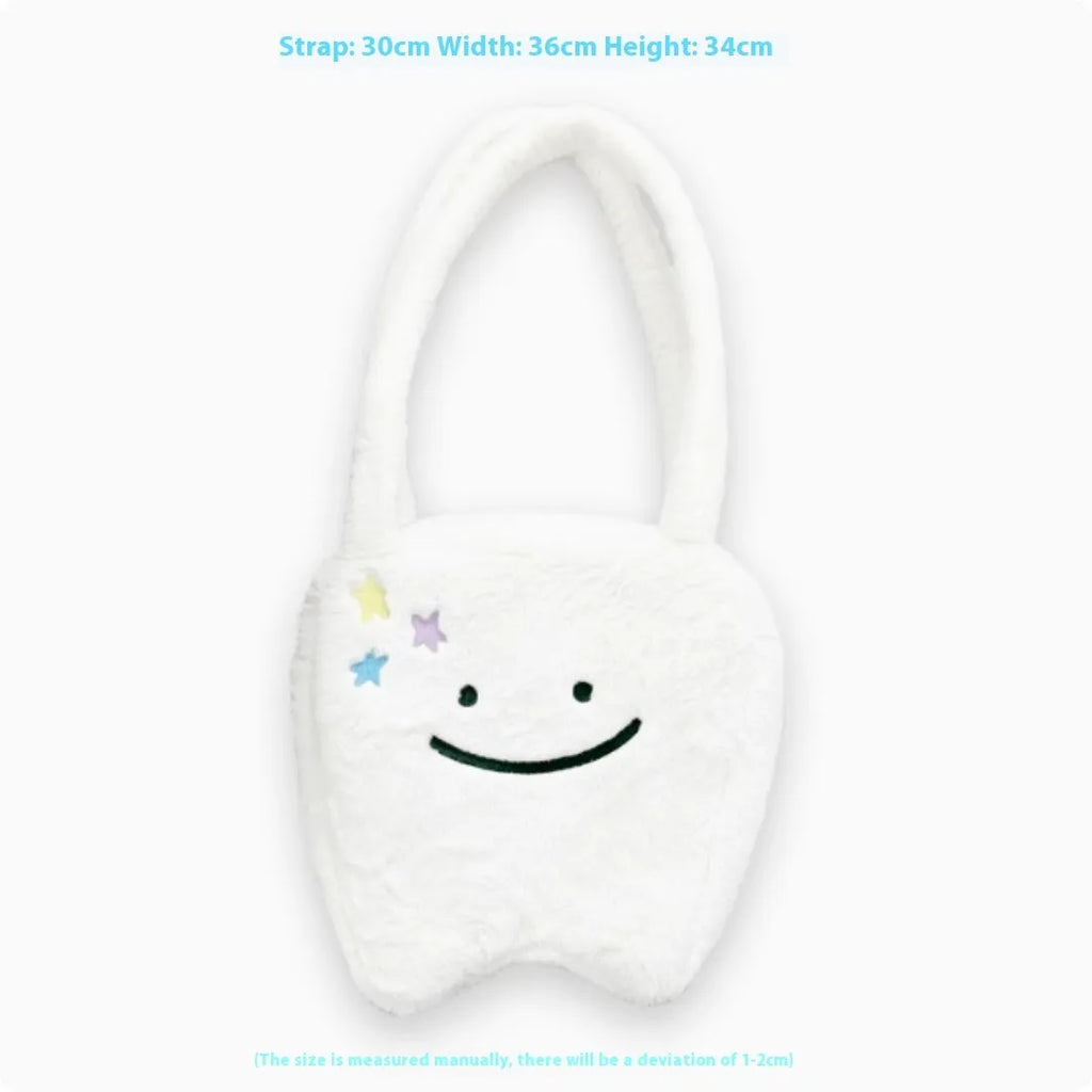 White plush large tooth design shoulder tote bag with a zipper, shown as a unisex crossbody bag.