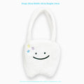 White plush large tooth design shoulder tote bag with a zipper, shown as a unisex crossbody bag.