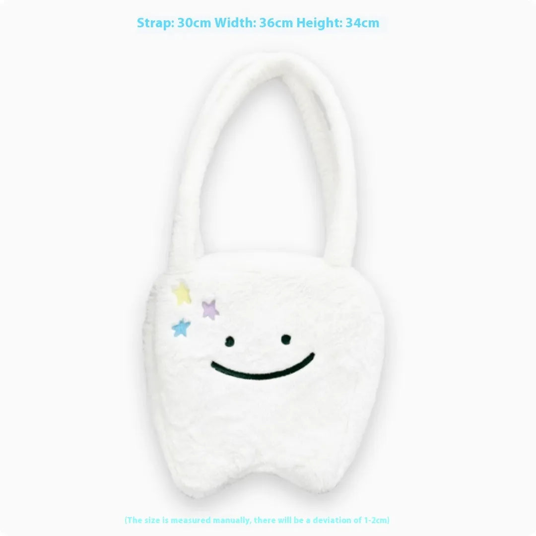 White plush large tooth design shoulder tote bag with a zipper, shown as a unisex crossbody bag.