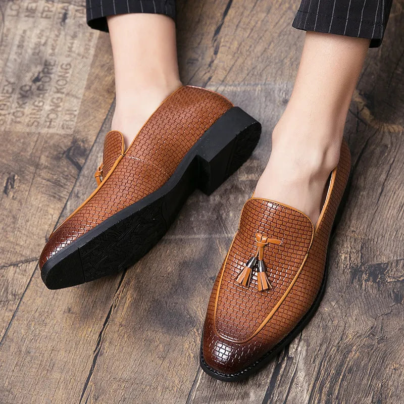 Men's black pointed toe slip on loafers with tassel detail on artificial PU leather upper