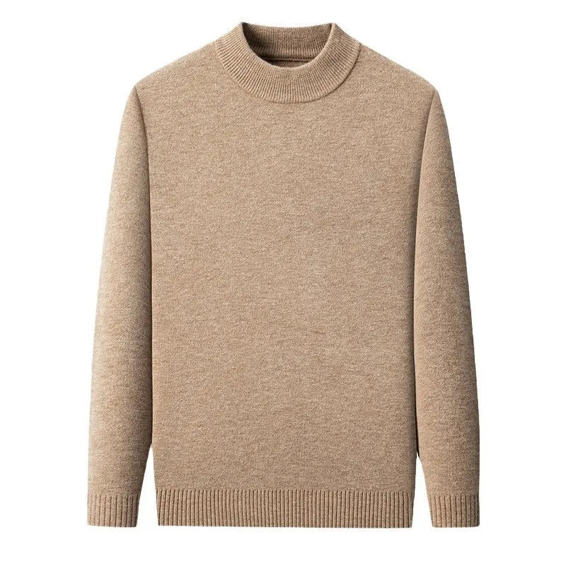 Man wearing a fine wool half turtleneck sweater in a solid colour, showing the regular fit and pullover style.