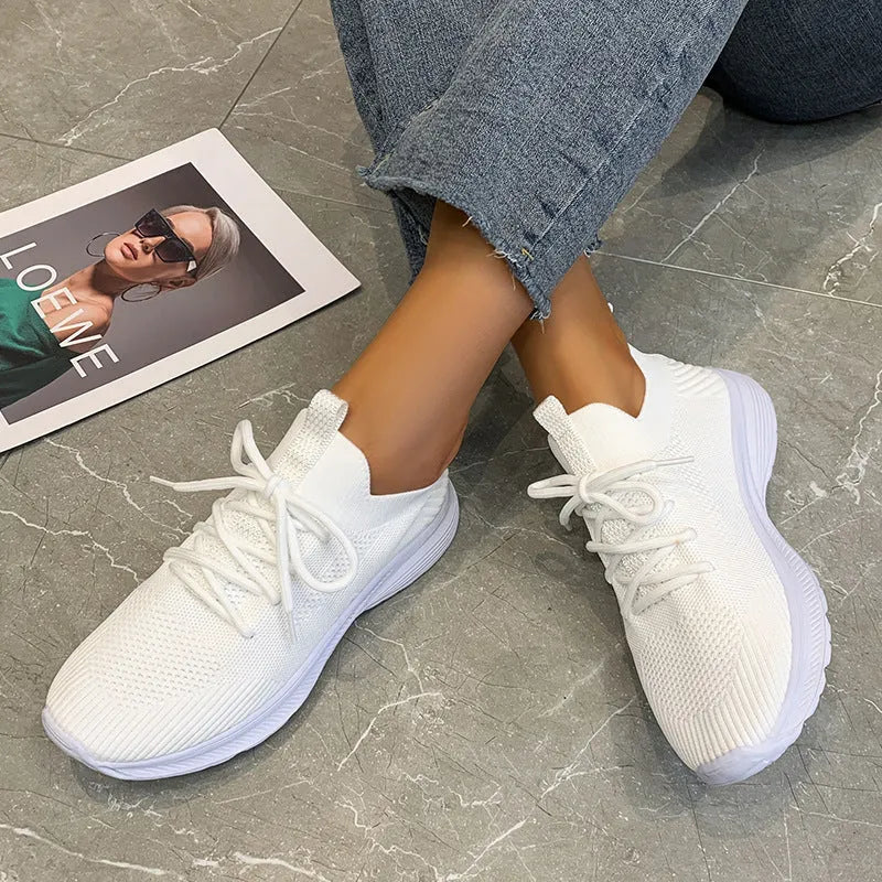 Women's mesh Flyknit running shoes, low top, flat heel, round toe, rubber sole, colour creamy white, side view