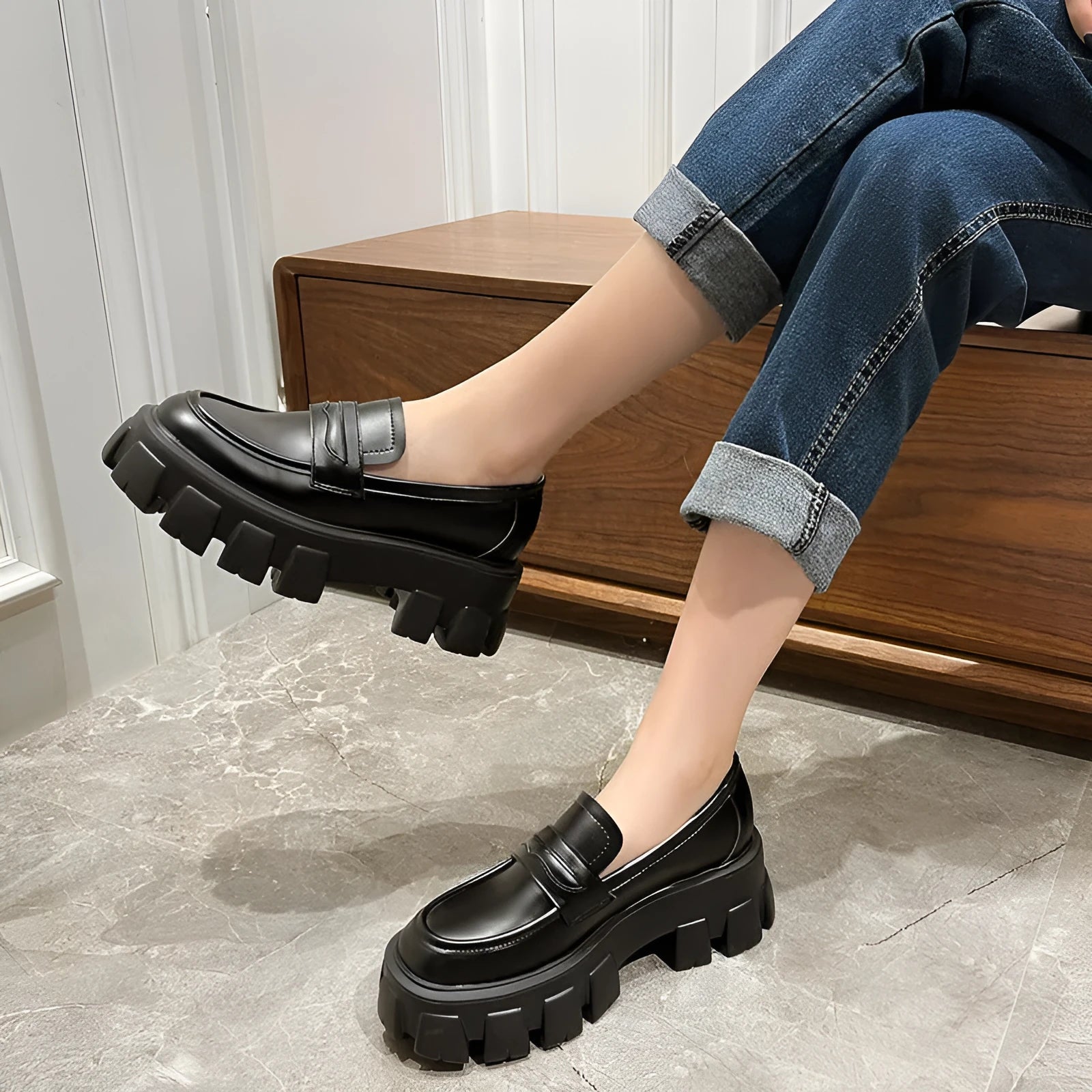 British style men's wide fit loafers in patent leather with a rubber sole.