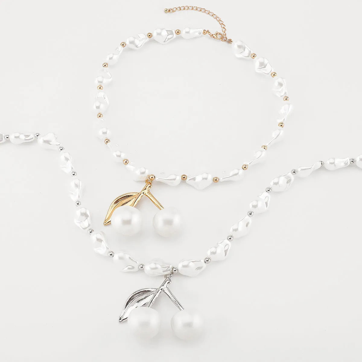 Women's creative necklace with irregular cherry pendant and imitation pearls on adjustable alloy chain