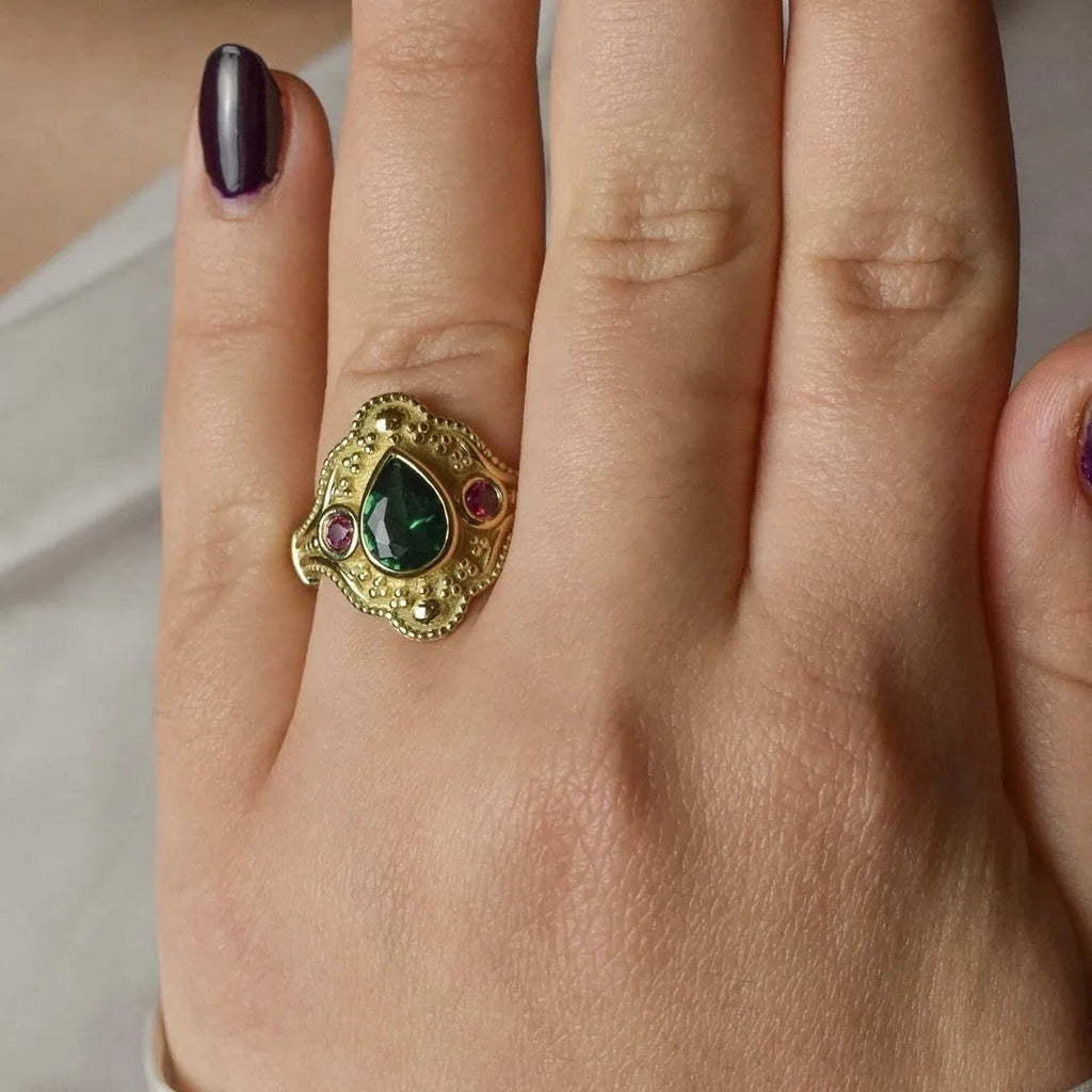 Gold-plated geometric women's fashion ring with ins style design on a plain background.