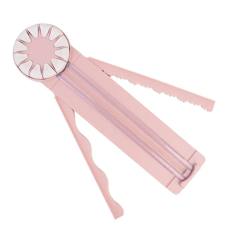 Pink and black plastic paper cutting machine with dotted guides and 12 cutting functions