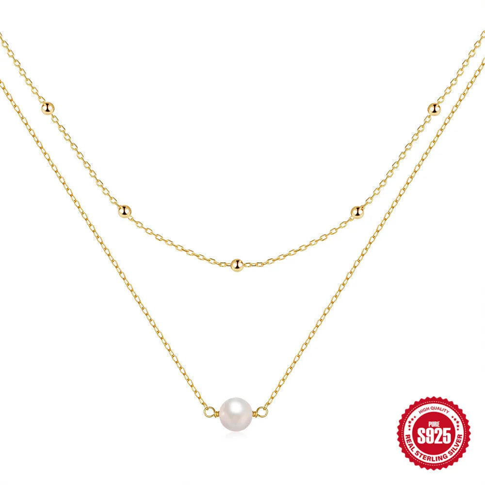 Sterling silver double layer pearl necklace with geometric pendant on ball bead chain