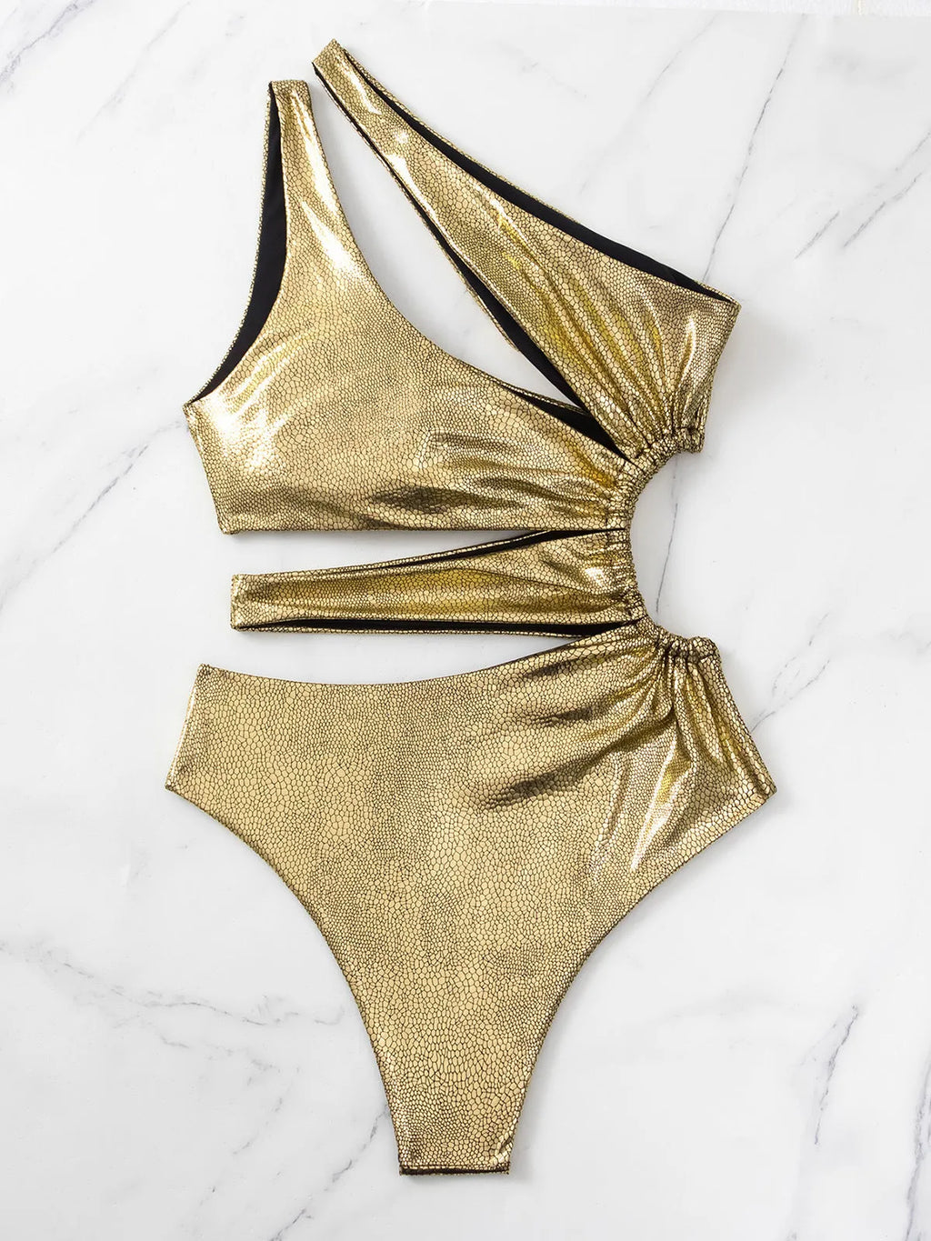 Gold coloured backless one-piece swimsuit for women on a white background