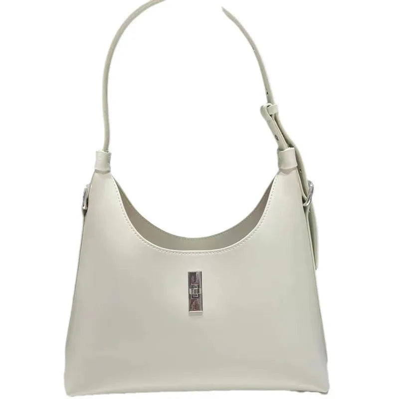 Women's dumpling-shaped crossbody shoulder bag in genuine cowhide leather with sandwich pocket and internal organisers