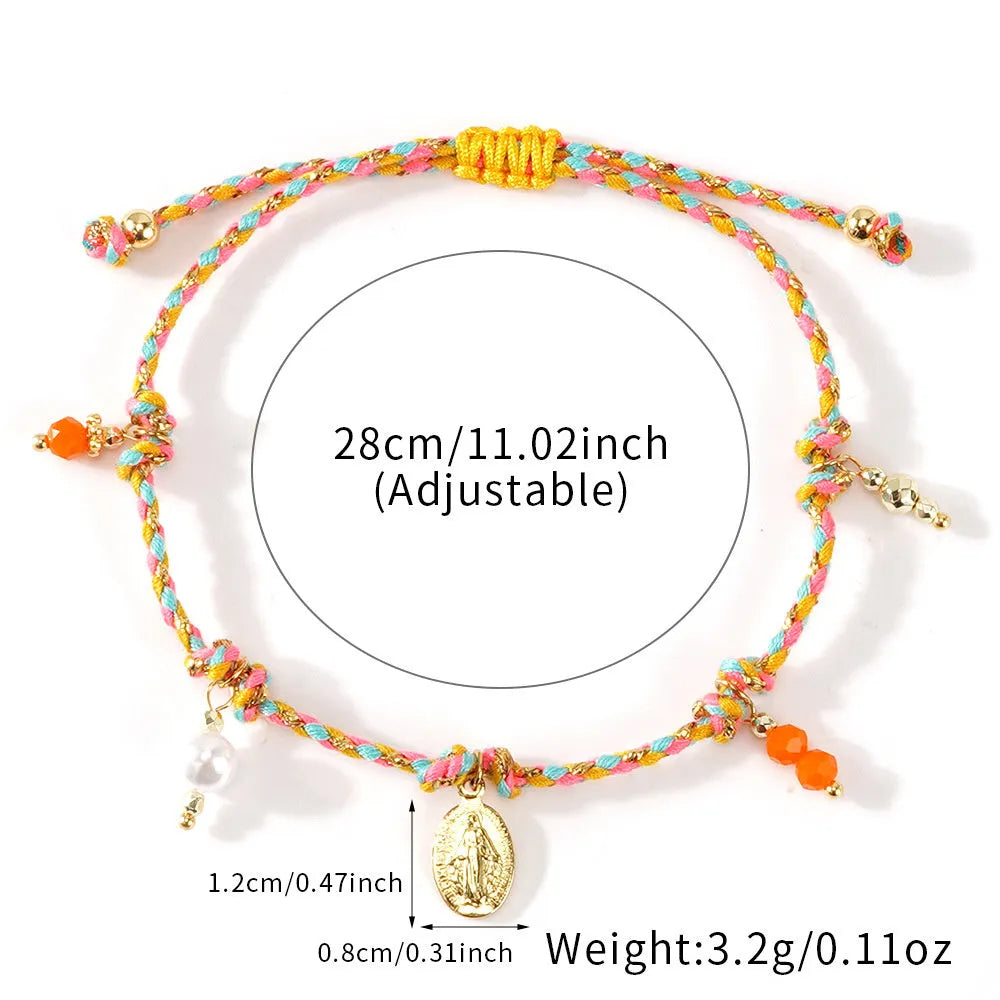 Close-up of hand-woven colourful braided rope bracelet with ethnic style and carrying strap tag function