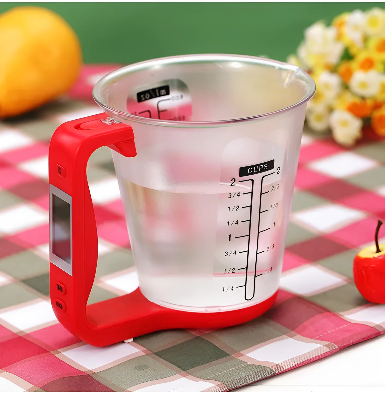 Digital kitchen scale measuring cup in green with LCD display on handle showing weight