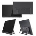 Black 15.6-inch portable LED monitor with adjustable stand on a desk next to a laptop.