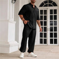 Men's apricot coloured cotton linen short sleeve shirt and trouser casual set laid flat.