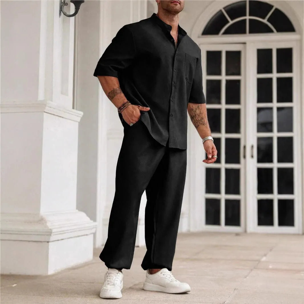Men's apricot coloured cotton linen short sleeve shirt and trouser casual set laid flat.