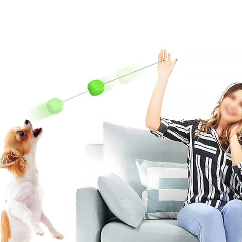 Green plastic squeaky pumpkin dog chew ball toy for small dogs measuring 68mm