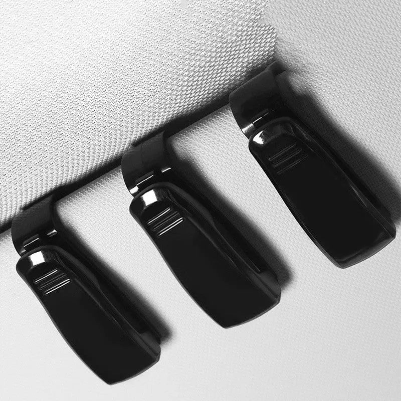 Black plastic car sun visor clip organiser for holding glasses and cards