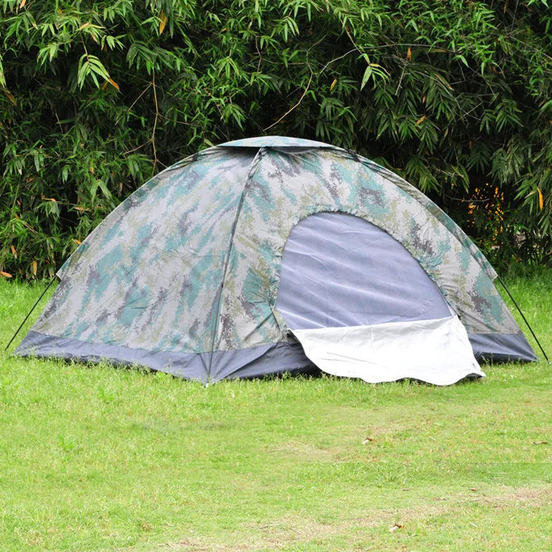 Green camouflage camping tent with triangular skylight, breathable mesh panels, and steel ground nails set up outdoors