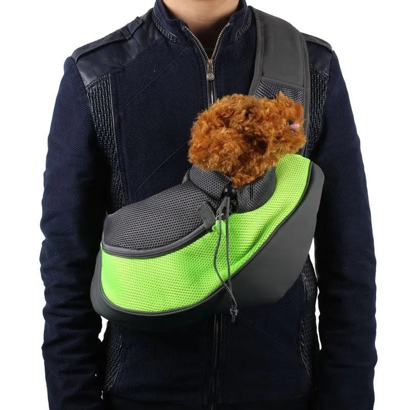 Blue polyester pet backpack for a cat showing shoulder straps and mesh ventilation.