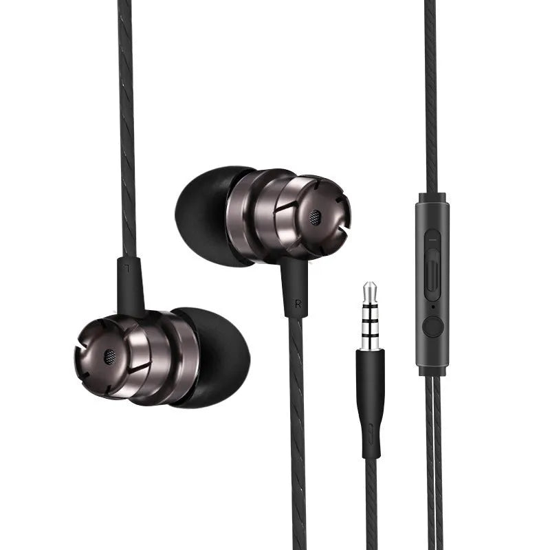 Metal turbo in-ear wired headphones with 3.5mm plug and microphone on a surface