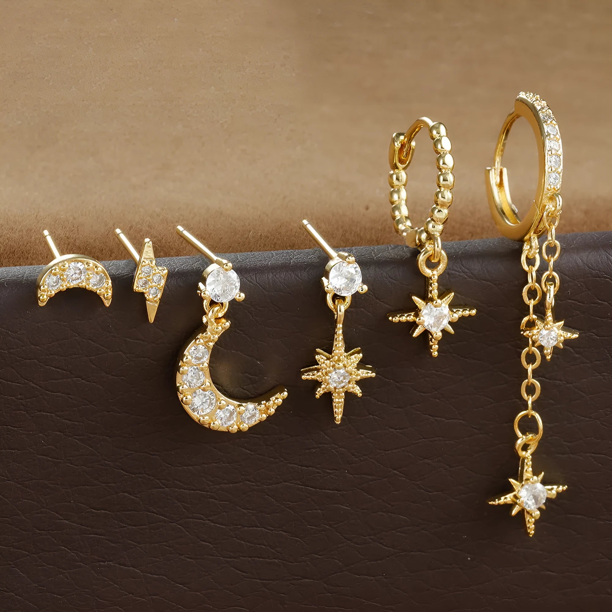 XINGX set of six gold chain tassel earrings with zircon studs for women