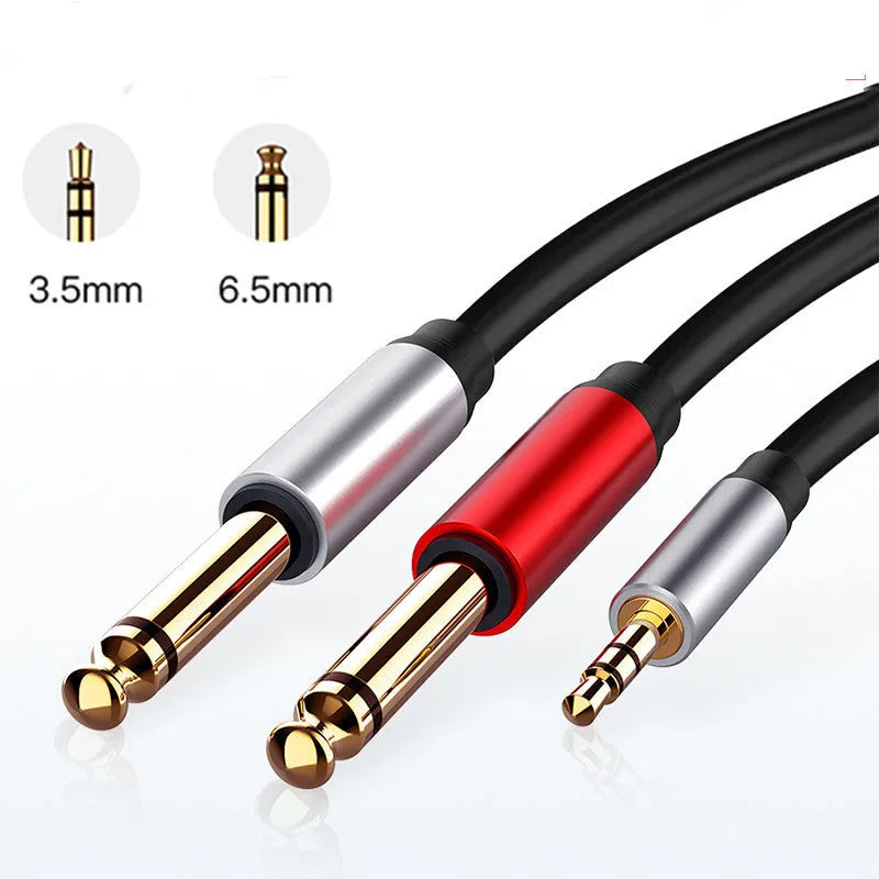 3.5mm to two 6.5mm male audio cable with gold-plated connectors on a black background