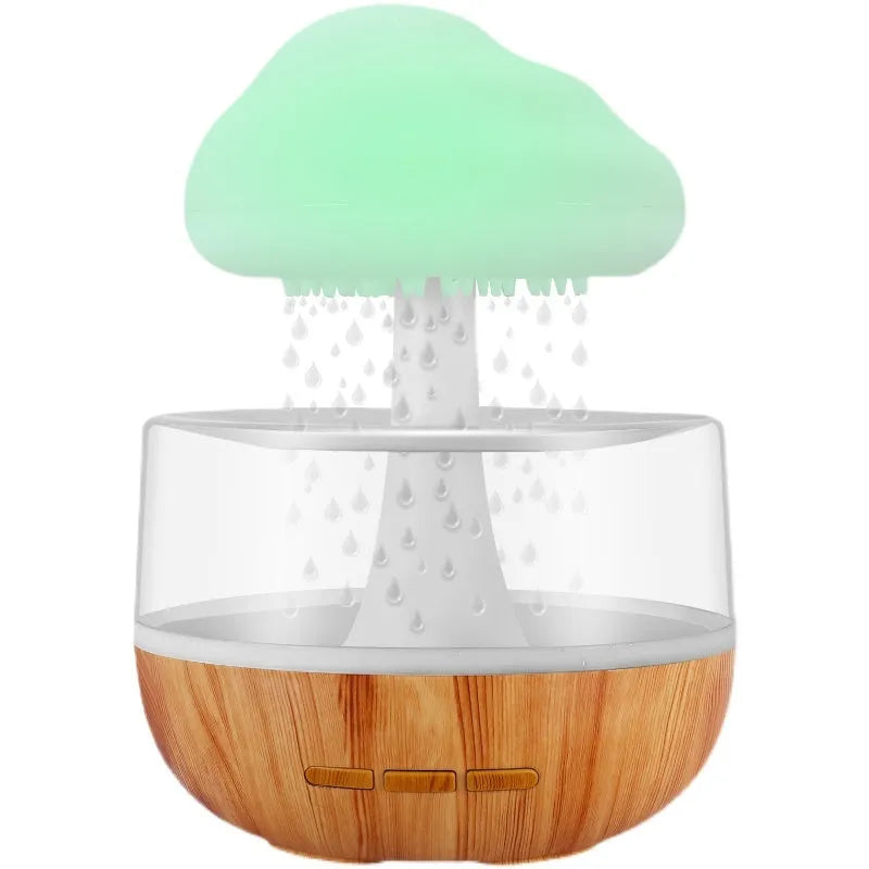 White USB micro humidifier and aromatherapy diffuser with colourful night light on.