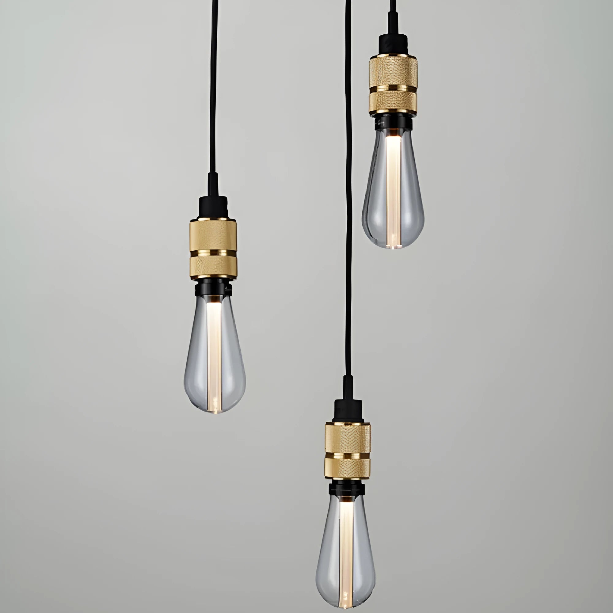 Retro DIY chandelier ceiling light with braided cord and metallic lamp holder in chrome, gold, rose gold, or shiny black finish.