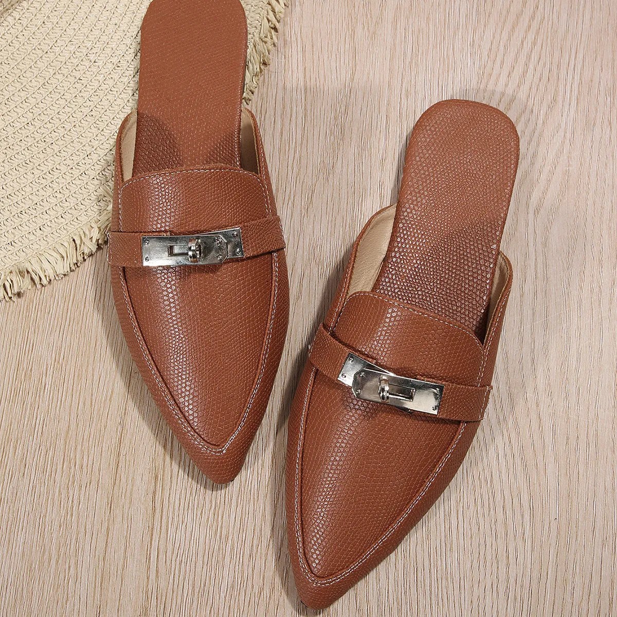 Light brown women's pointed-toe low heel casual semi-slippers on a neutral background