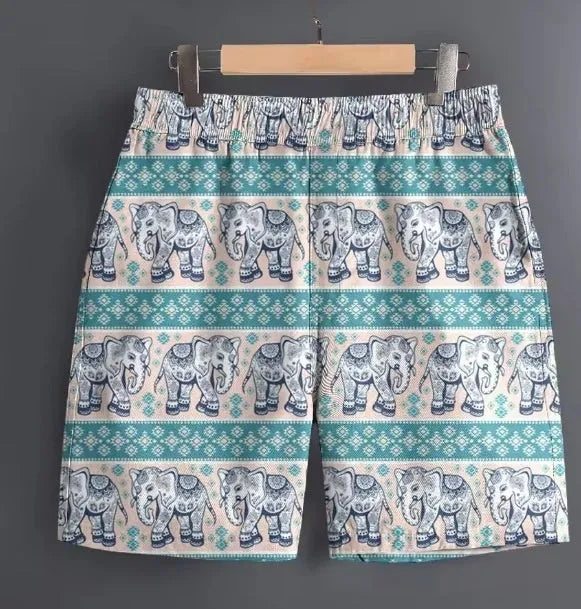 Men's patterned polyester sports shorts on a hanger, showing camouflage and stripe design options.