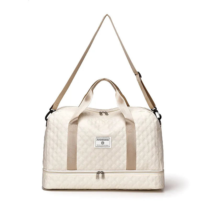 Portable Oxford cloth travel bag in street trend style with large 55L capacity.