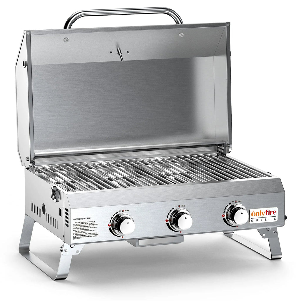 Silver desktop gas barbecue grill with three stainless steel burners and foldable legs