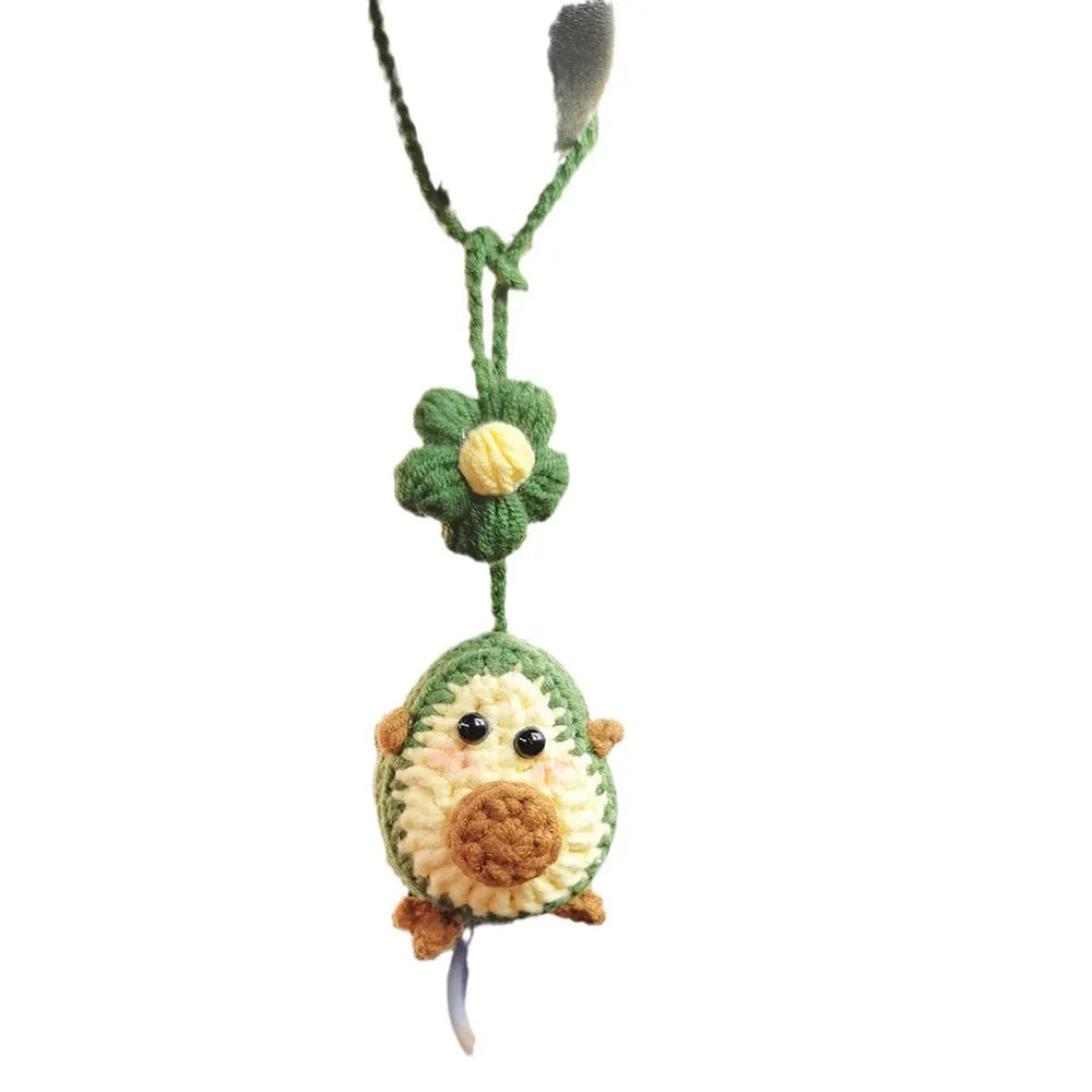 Handmade crocheted avocado rainbow flower car pendant in wool yarn for colourful vehicle interior decoration