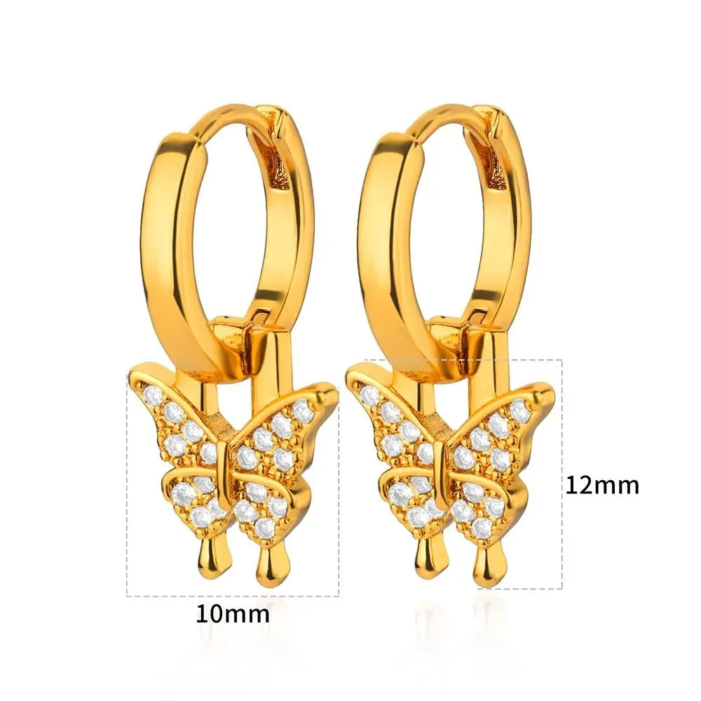 Geometric butterfly-shaped copper earrings for women with heart and star design details.