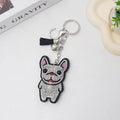 French dog rhinestone keychain with 5-7cm electroplated alloy animal charm in caramel colour