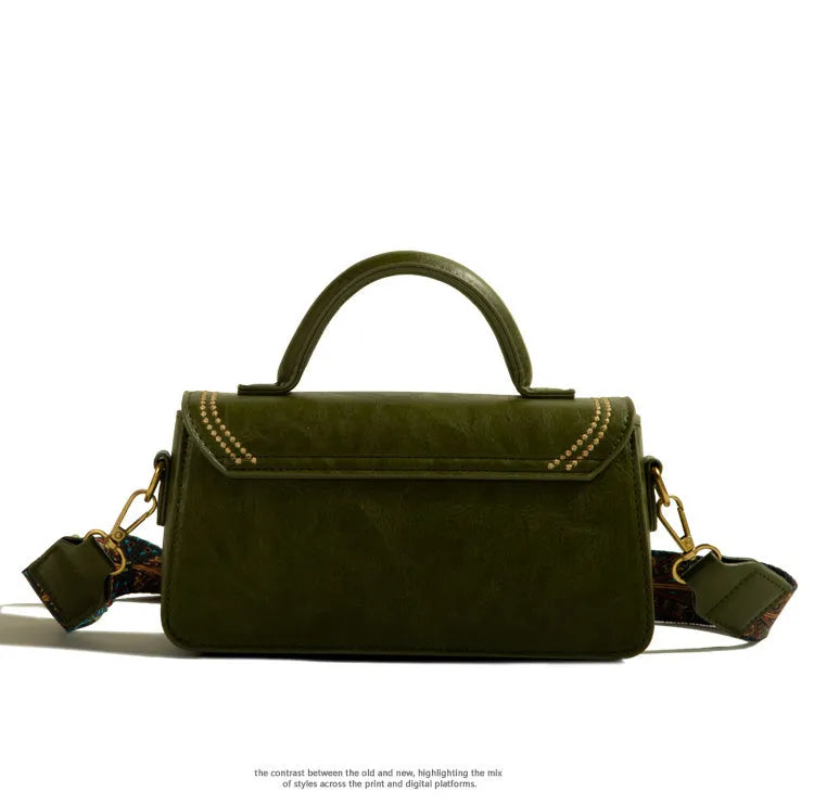 Brown retro messenger bag with sewing thread detailing showing mobile phone compartment and sandwich pockets