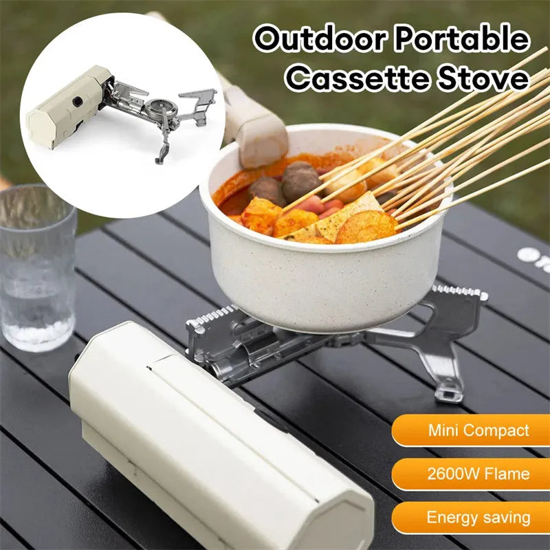 Portable folding camping gas stove with 2.6 kW burner and carry bag in green