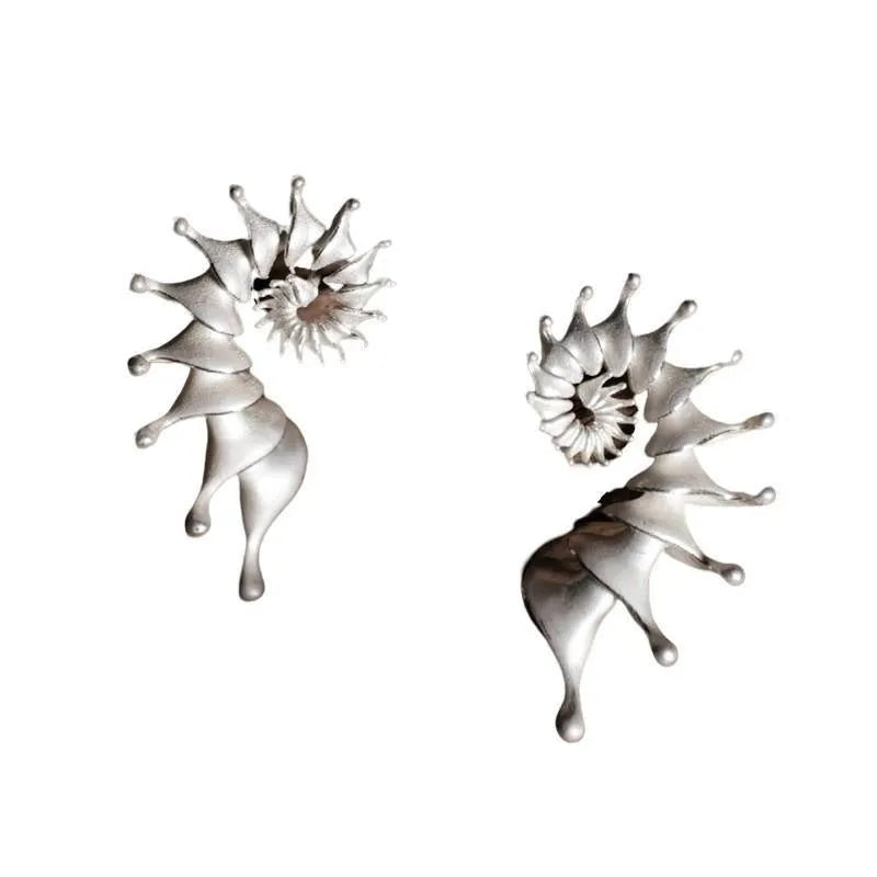 Exaggerated three-dimensional conch matte finish stud earrings with irregular shape