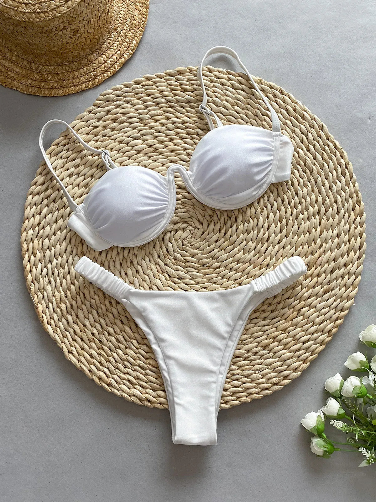 Women's black underwire bikini swimsuit with brief bottoms on a mannequin.