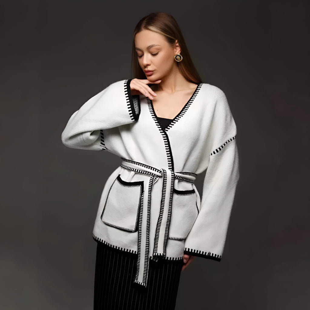 Lace-up front knitted cardigan in a loose fit, shown in black, camel, and white colour options.