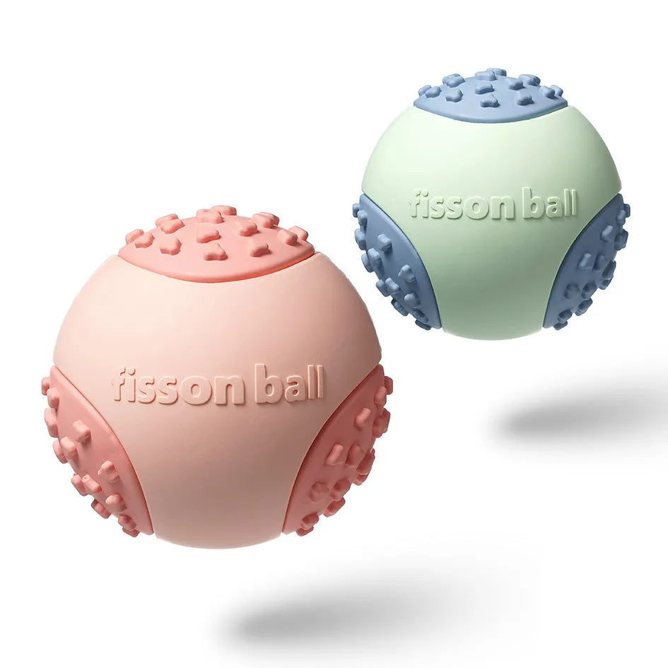 Green and pink 64mm rolling dog ball toy for small and medium breeds