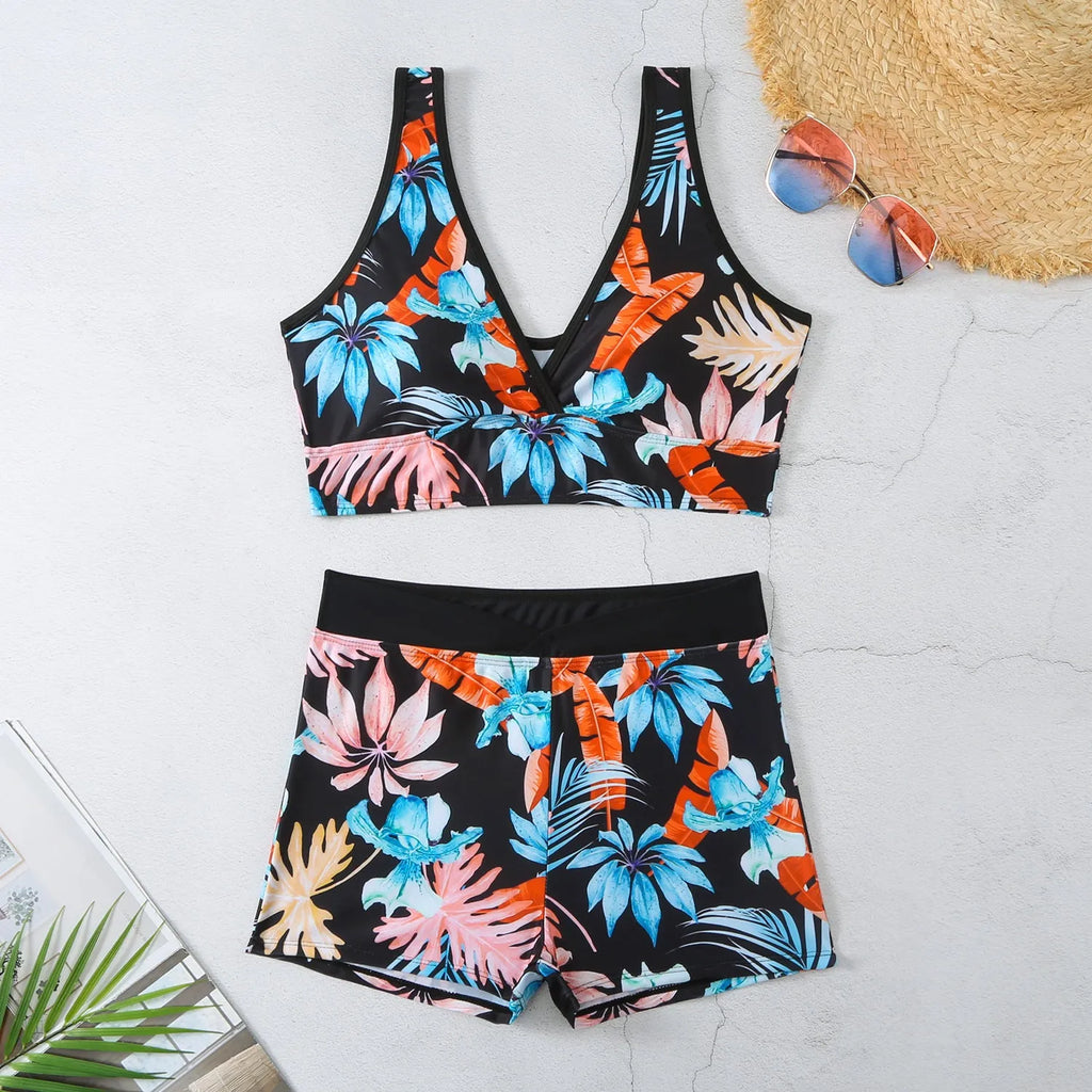 Women's printed boxer style two-piece swimsuit in multicolour pattern with sleeveless top
