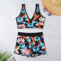 Women's printed boxer style two-piece swimsuit in multicolour pattern with sleeveless top