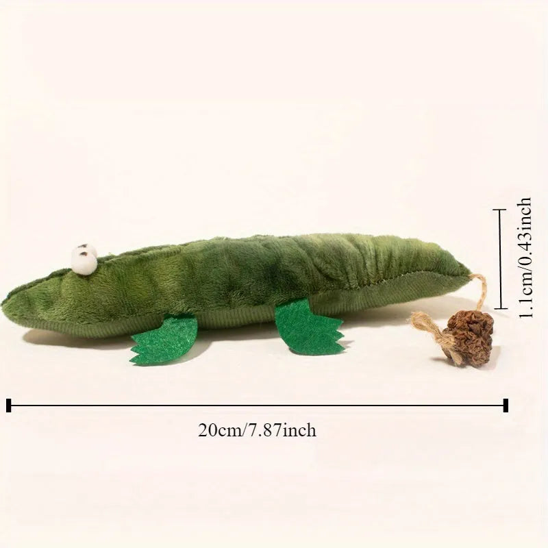 Green plush alligator cat toy with plant-based catnip and peppermint scent for oral cleansing