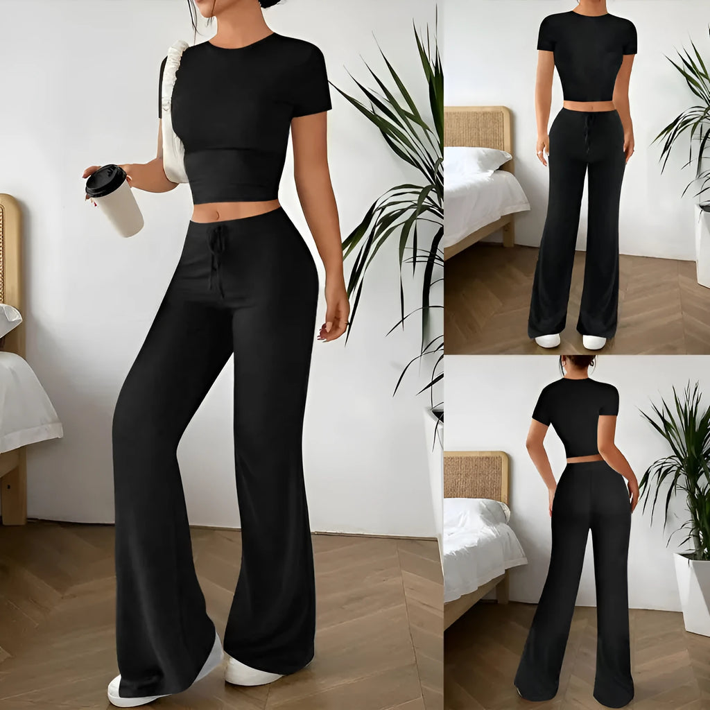 Black high waist trousers and short sleeve t-shirt co-ord set on hanger