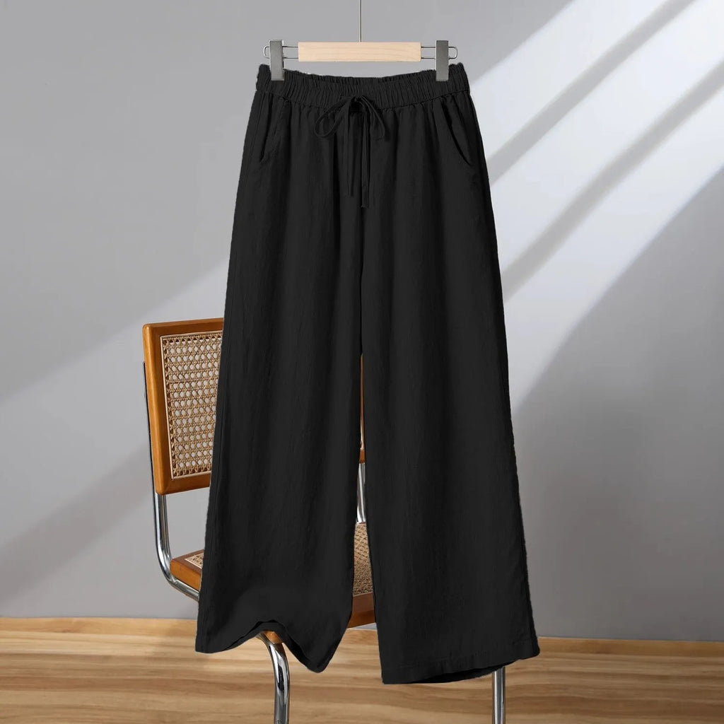 Women's straight-leg casual trousers with an elasticated drawstring waist in apricot colour