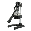 Cast iron manual citrus juicer with stainless steel funnel showing black finish