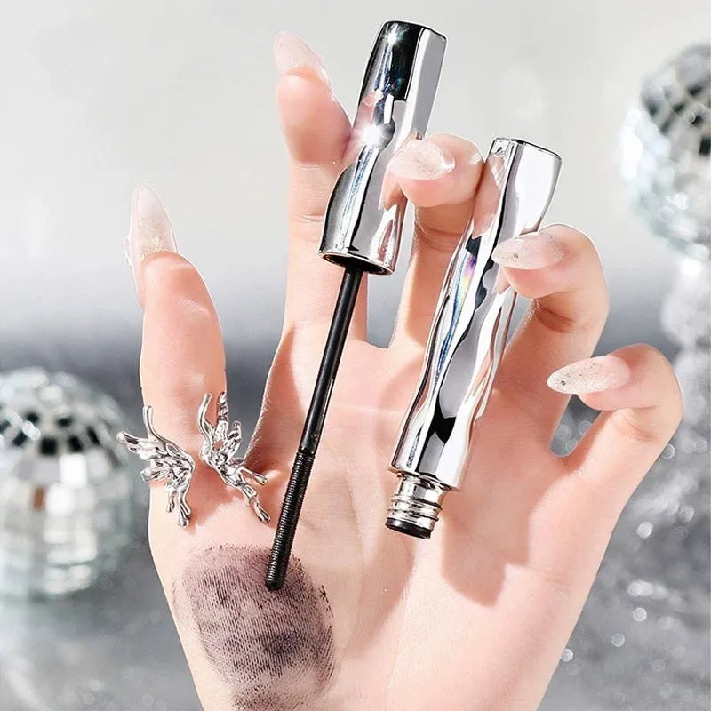 Waterproof steel tube mascara in black and brown colours with optional eyelash curler.