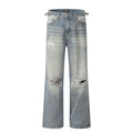 Blue men's retro straight-leg jeans with ripped details and a zipper fly.